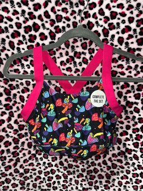 Zumiez women’s Black Sports Bra with Neon Mushroom Print and Hot Pink Straps